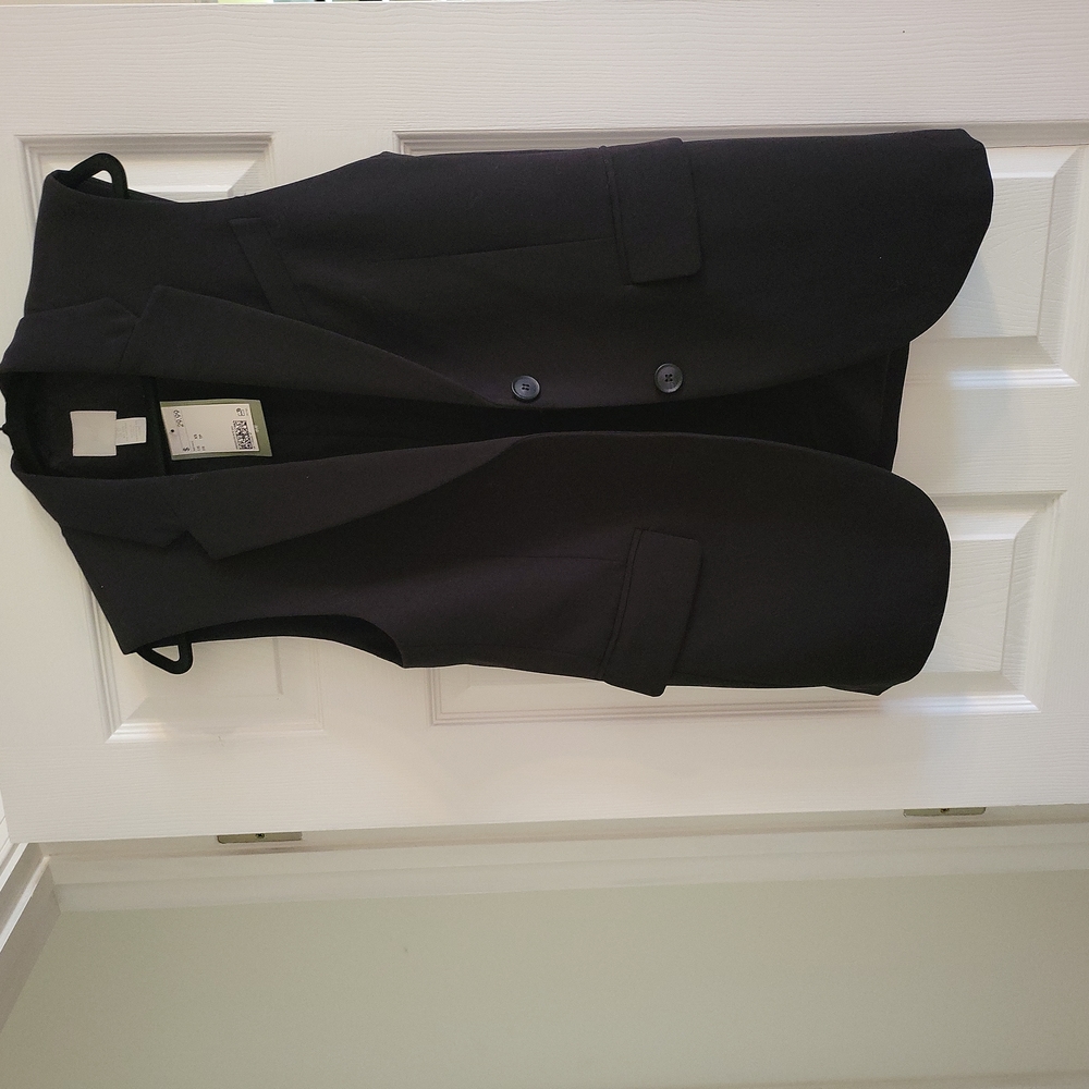 Sleeveless oversized black blazer